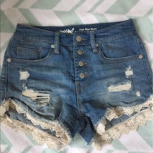 Light wash high waisted shorts with lace detail