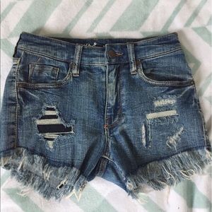 Dark high waisted ripped shorts