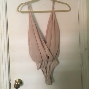 Cream flowy body suit