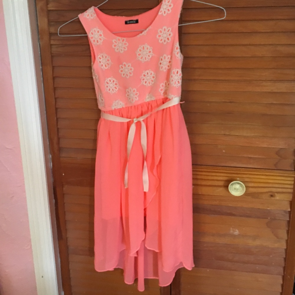 A  pretty pink dress and can be use for many thing