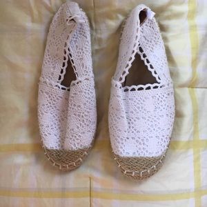 I am selling a casual white shoes you will love .