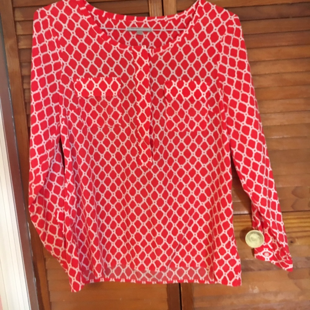 Selling a red long sleeve shirt for women to wear