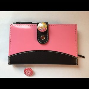 Studio66 LLC notebook with two decorative snaps.