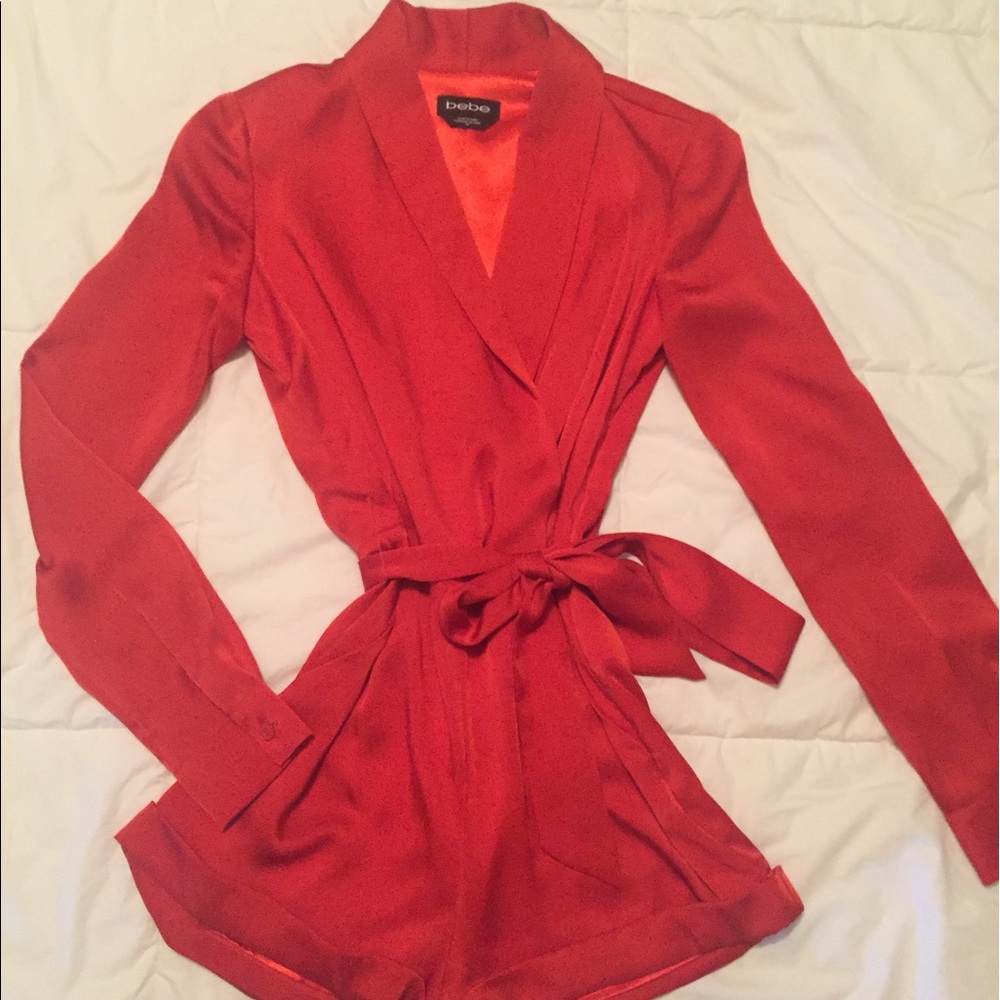 Orange Tie Waist Romper . Perfect for date night.