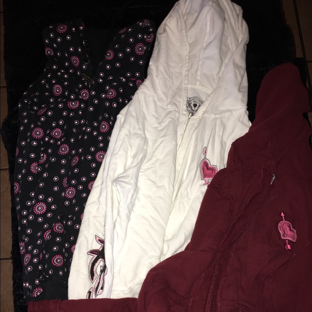 3 pair of sweaters