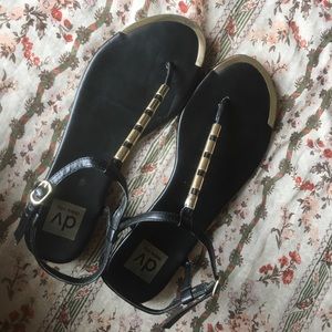 Black and gold gladiator sandals size 7.5