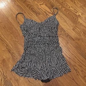 One piece black and white skirted swimsuit