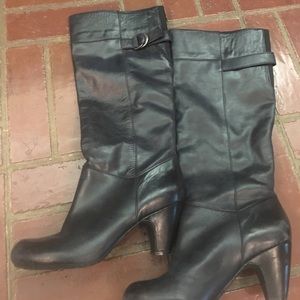 Just below the knee black boots