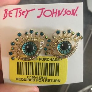 Gold tone glass stone and enamel eye stud earring