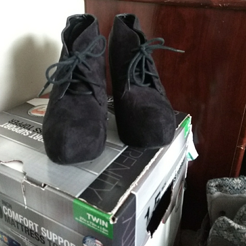 black wedge booties.