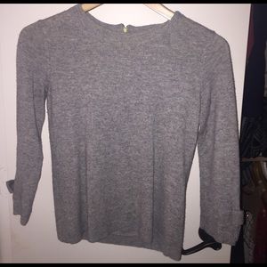 Gray Kate Spade sweater with bow embellishments