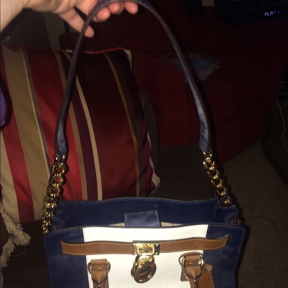 Michael Kors Navy, White, and brown purse.