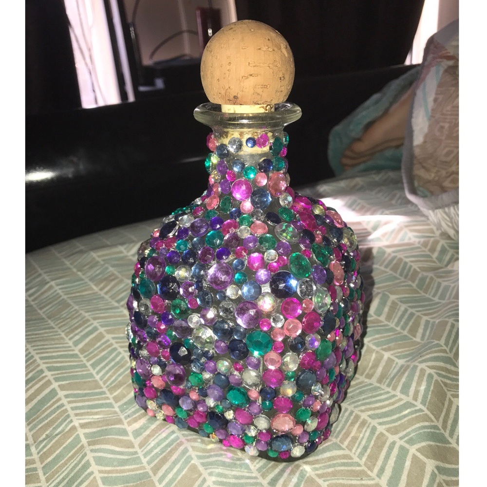Patron bottle with gems