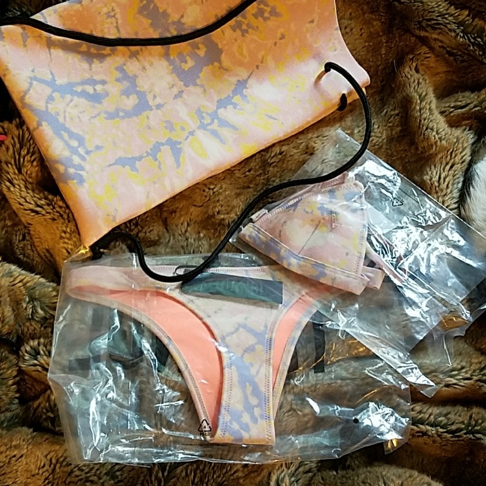 Brand new in packaging triangl swimsuit