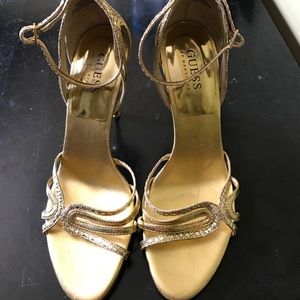 Guess gold(colored) sandals, women's size 7