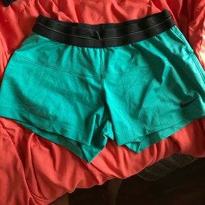 Teal blue Dri-fit Nike running shorts