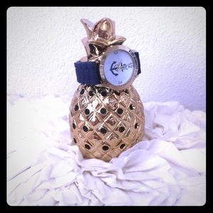 Navy blue and gold anchor watch.