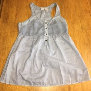 A fitted top with a flared bottom shirt