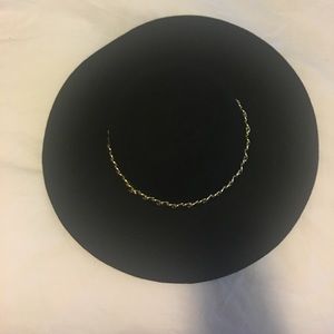 Black floppy hat with silver chain detailing