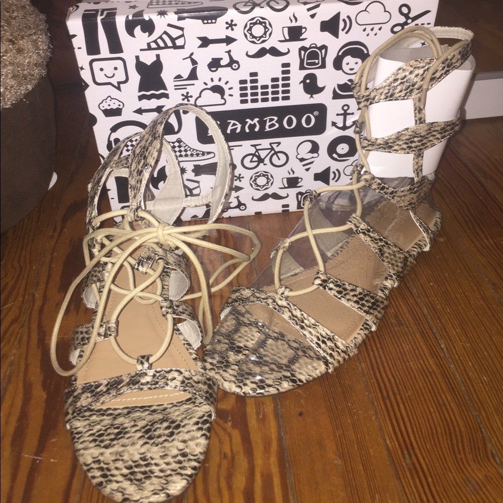 Lace up snake print sandals