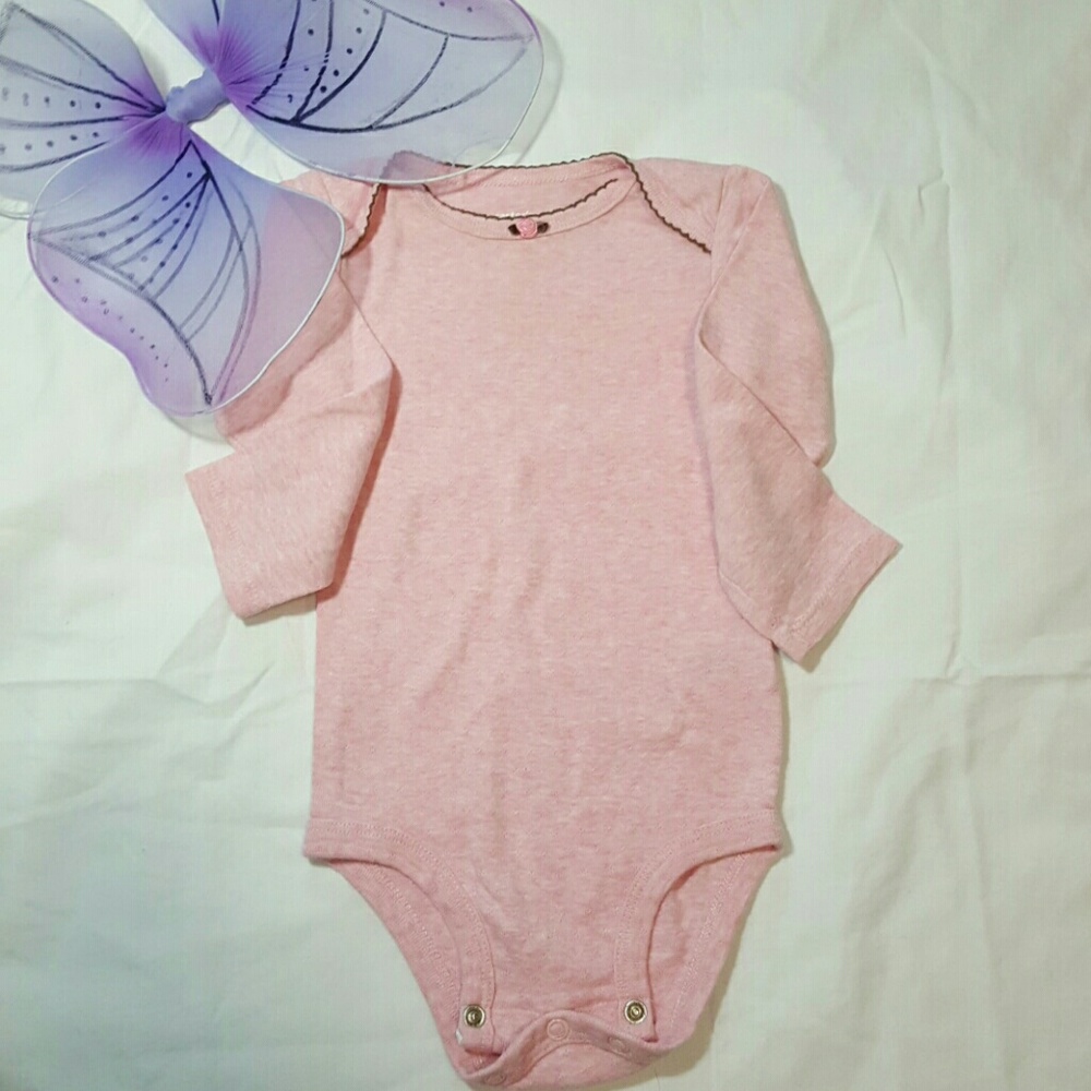 Pink onesie with rose detail