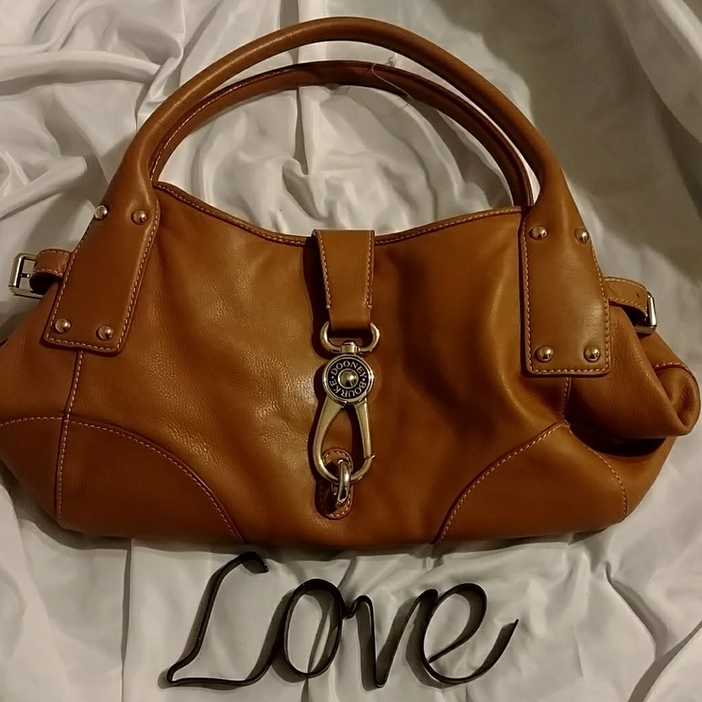 Dooney , lobster clasp purse