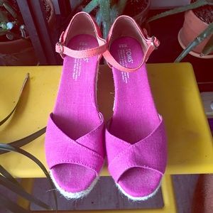 Pink and orange espadrilles by TOMS
