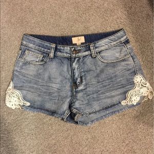Denim shorts with crochet accents