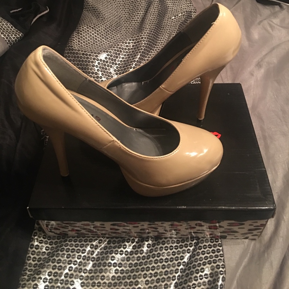 Nude Heels, lightly worn around the house.