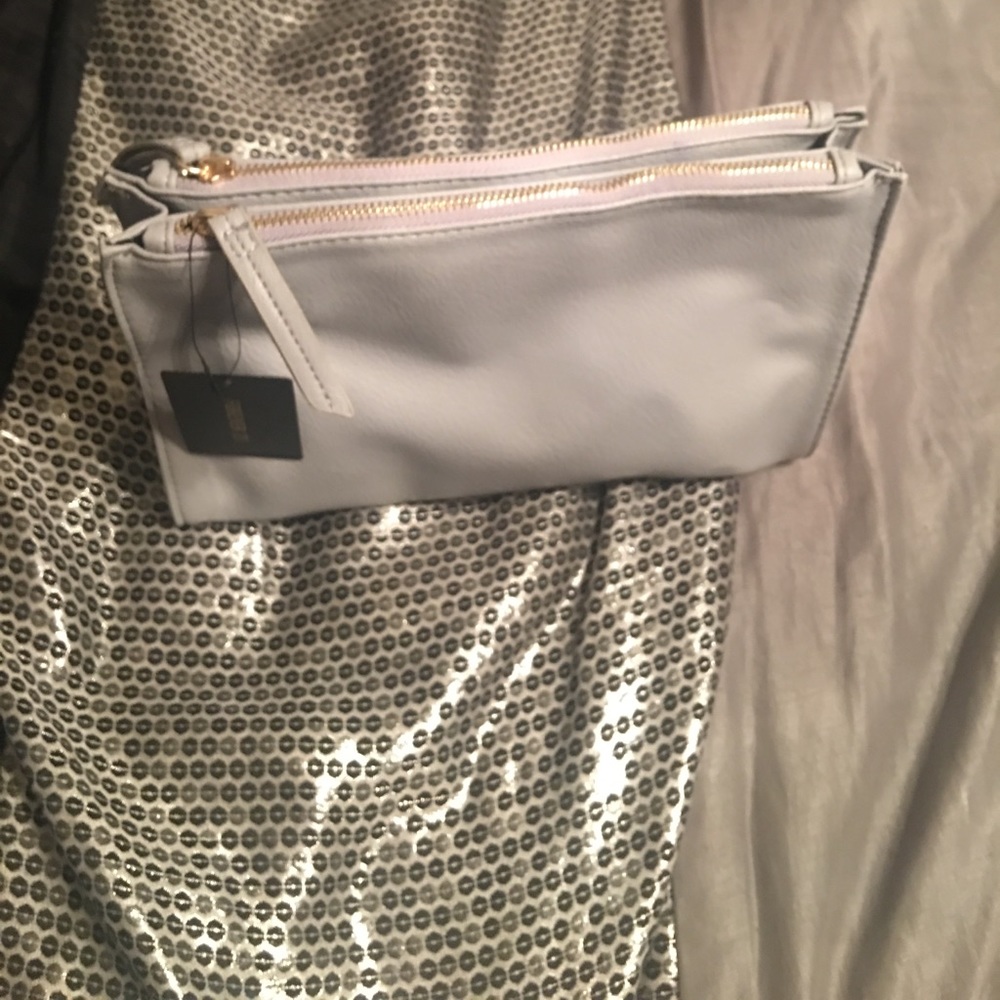 Brand new handbag/clutch with tag