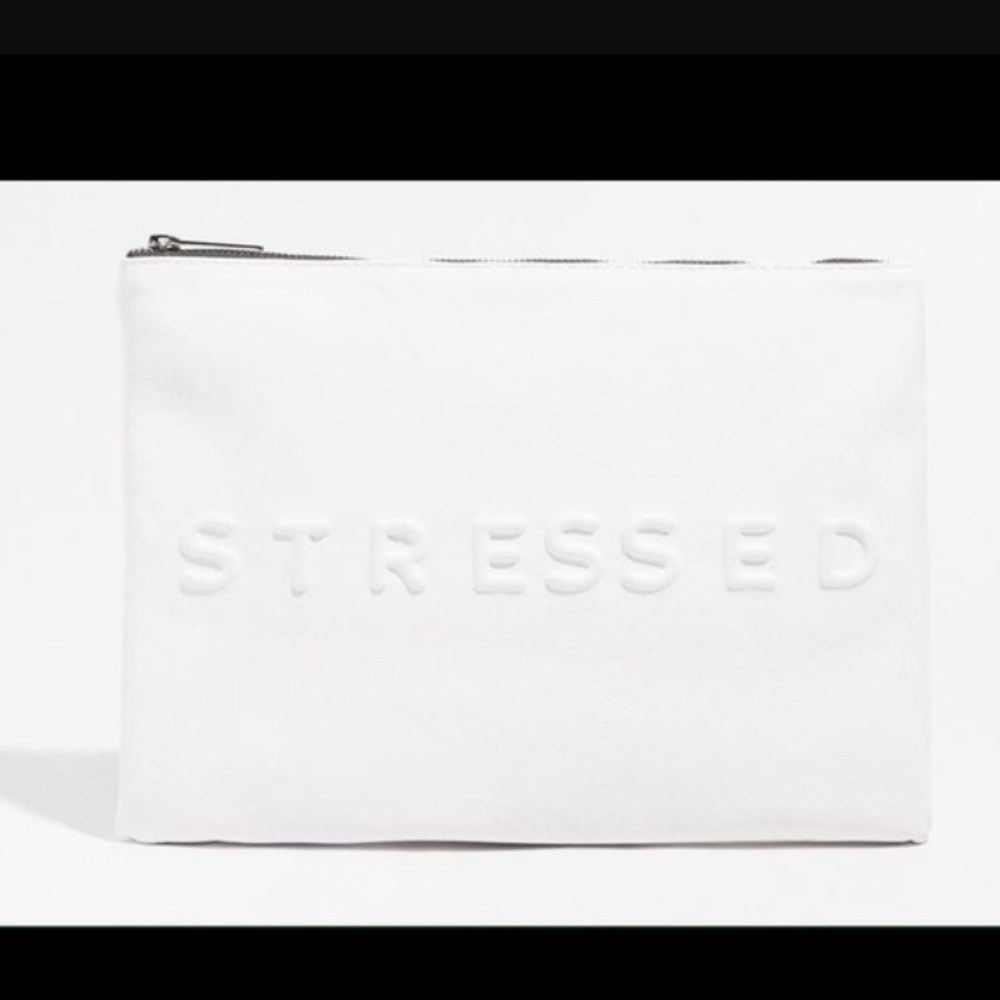 Zara stressed but well dressed clutch