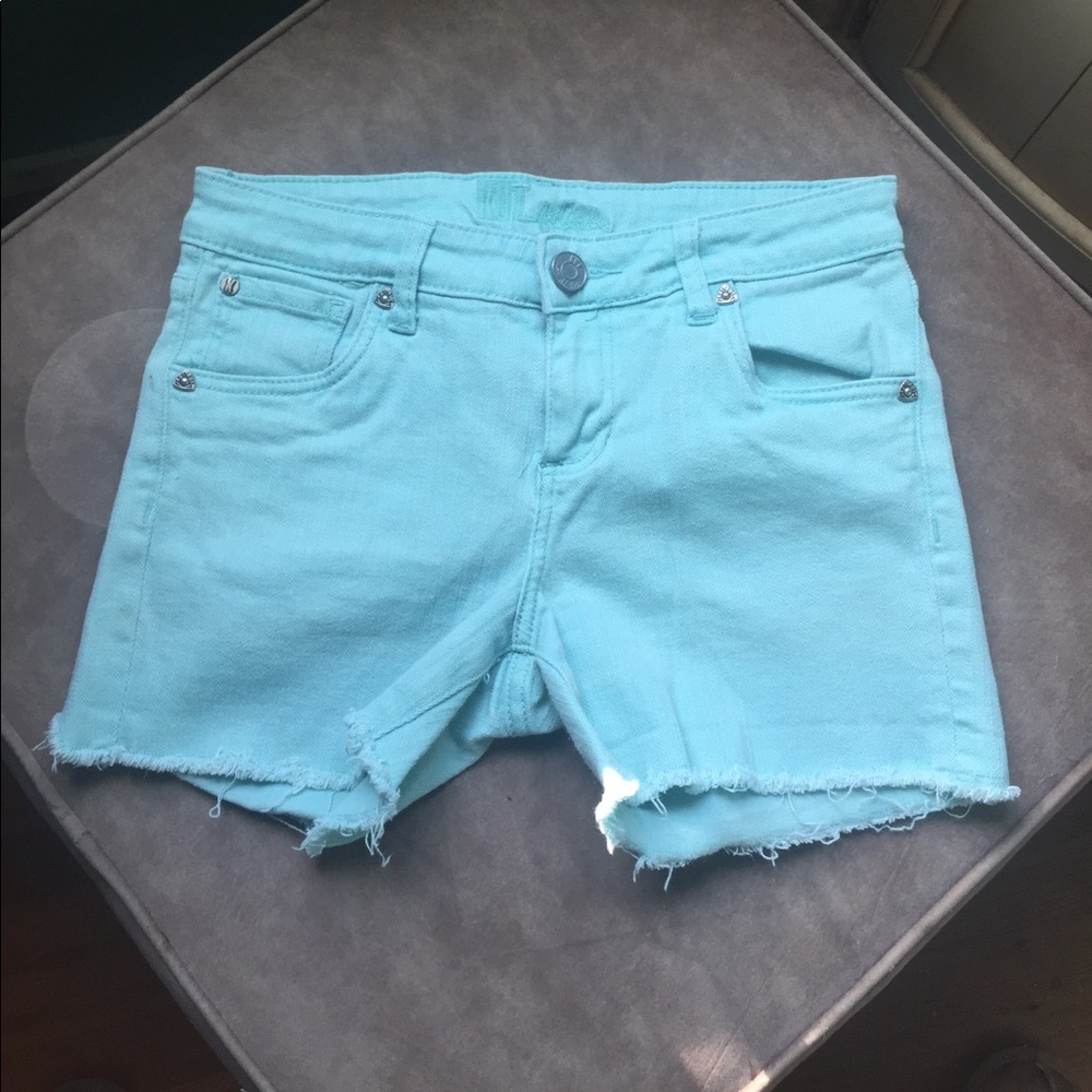 Mint cut off shorts