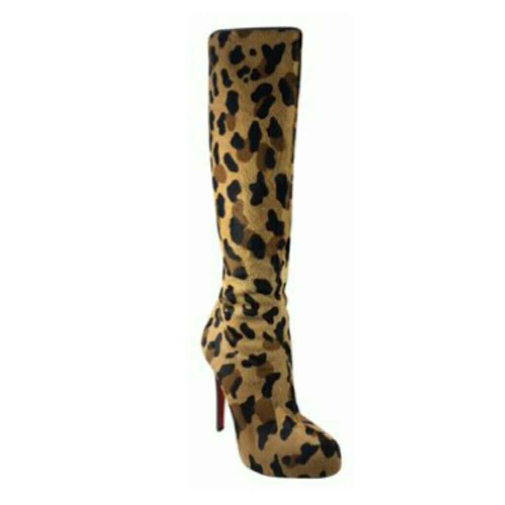 Fifi Botta 100 Louboutin boots.