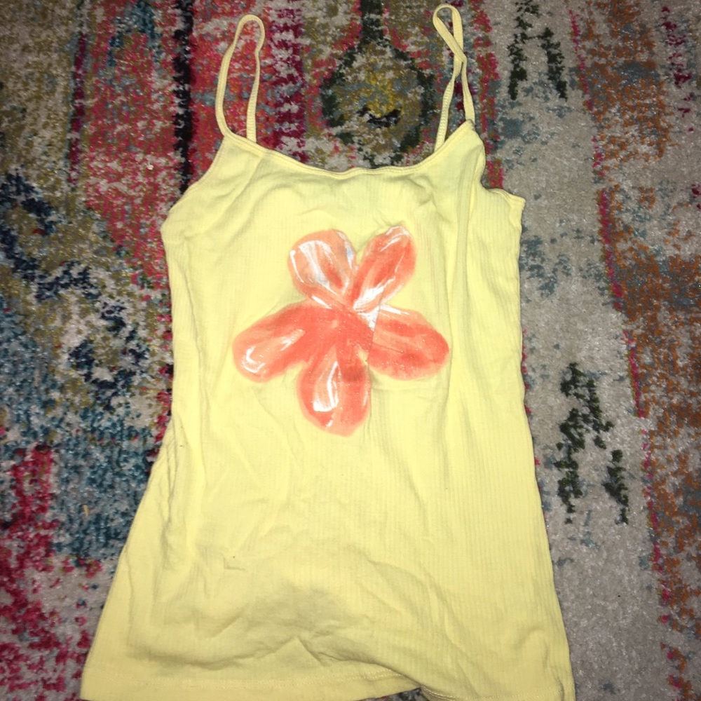 Yellow tank with hibiscus