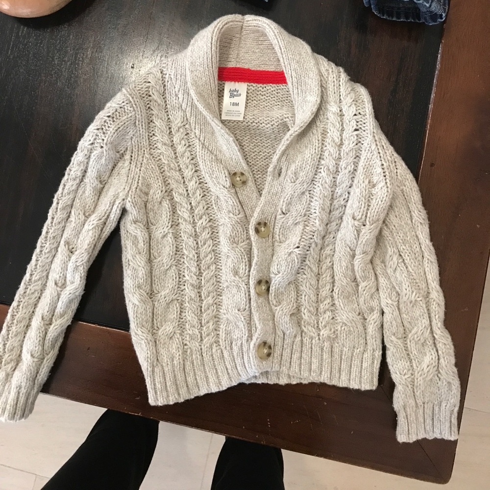 Baby sweater tan color never warm never washed
