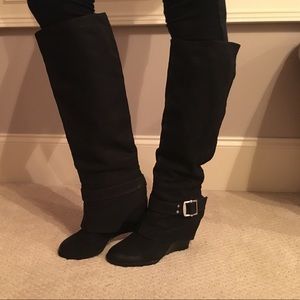 Black leather wedge boots. Only worn once!