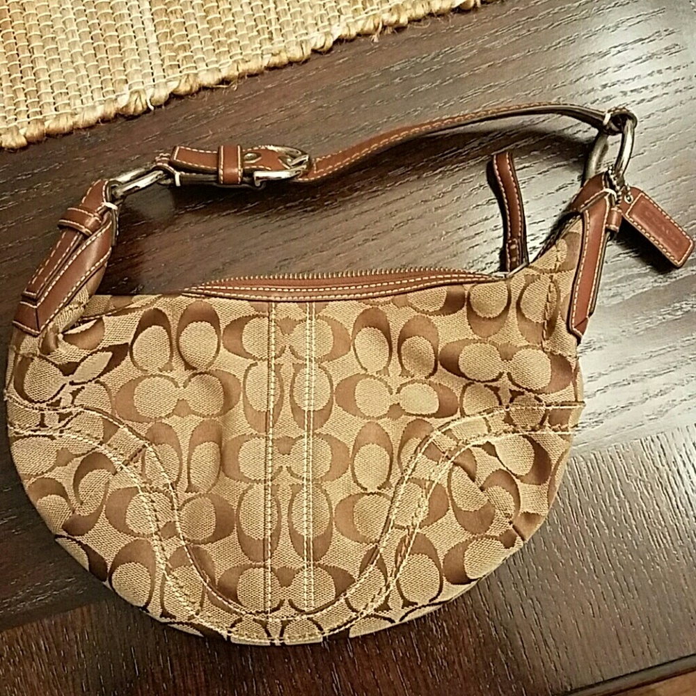 Authentic Coach signature small hobo purse.