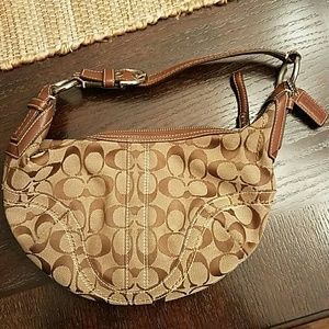 Authentic Coach signature small hobo purse.