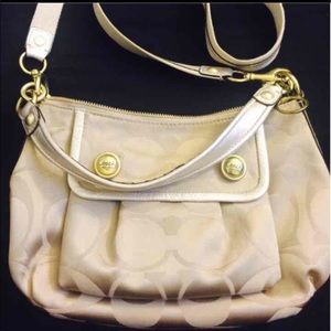 Beautiful gold cross body Coach bag
