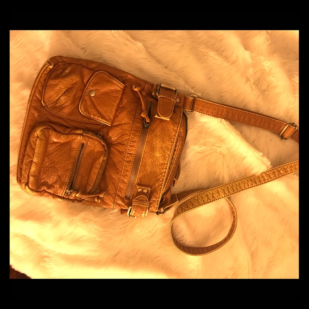 Distressed vegan leather cross body bag