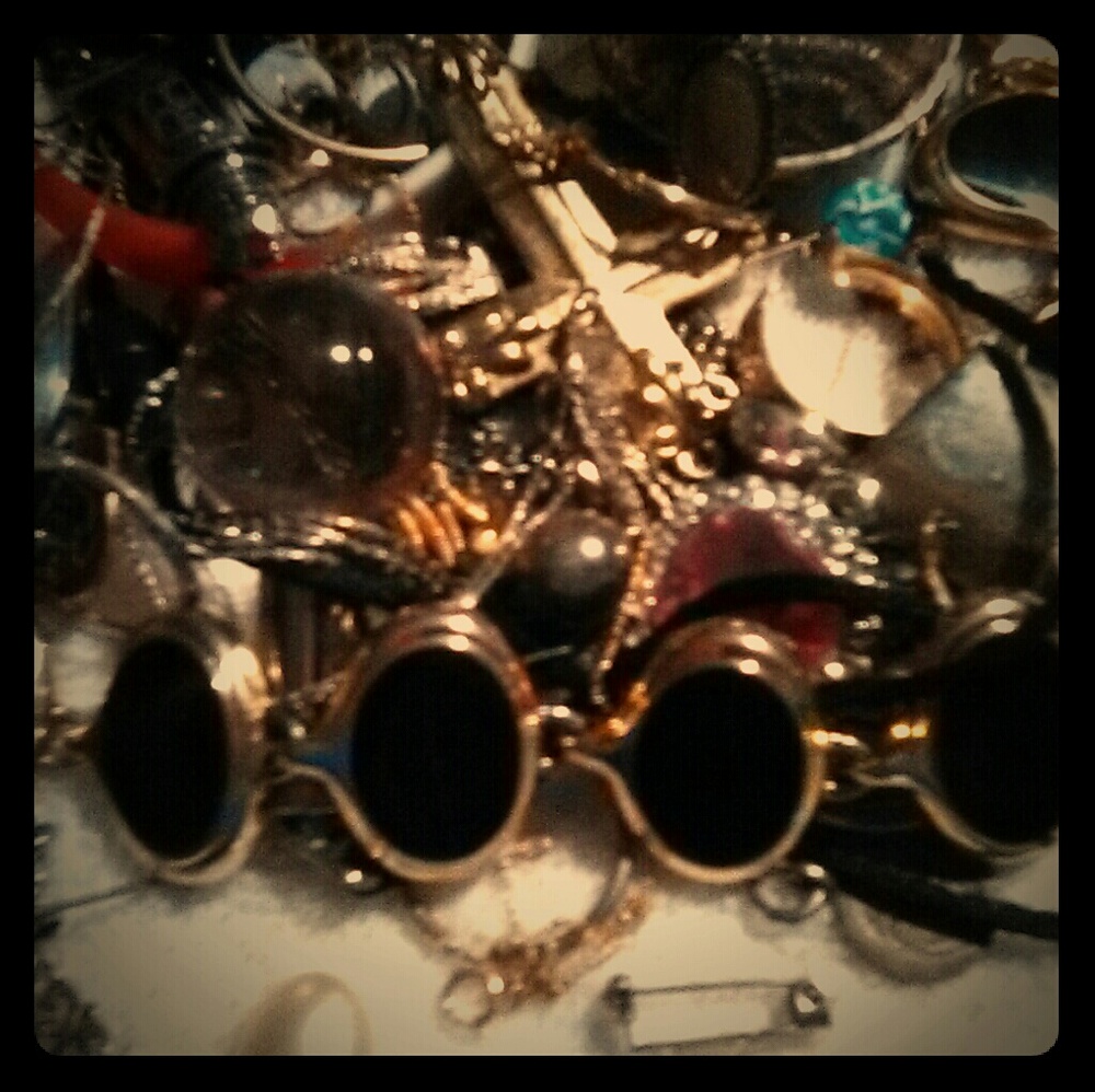 A variety jar of junk drawer jewelry.