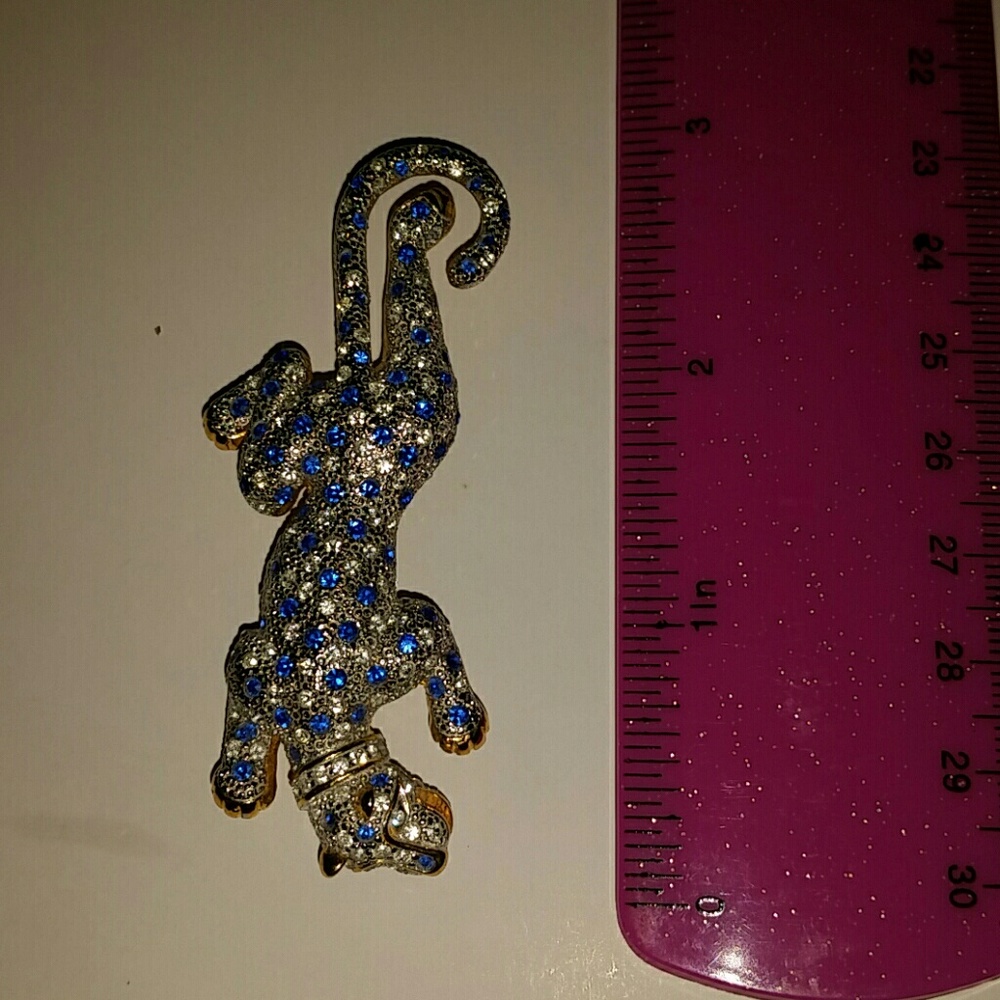Crystal, blue and gold tiger pin