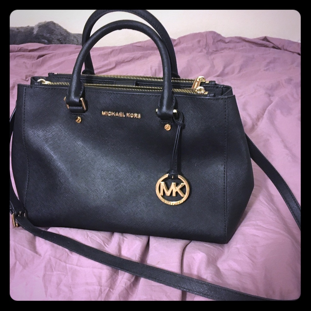 Michael Kors black shoulder bag.