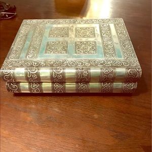 Ornate foldout jewelry box.