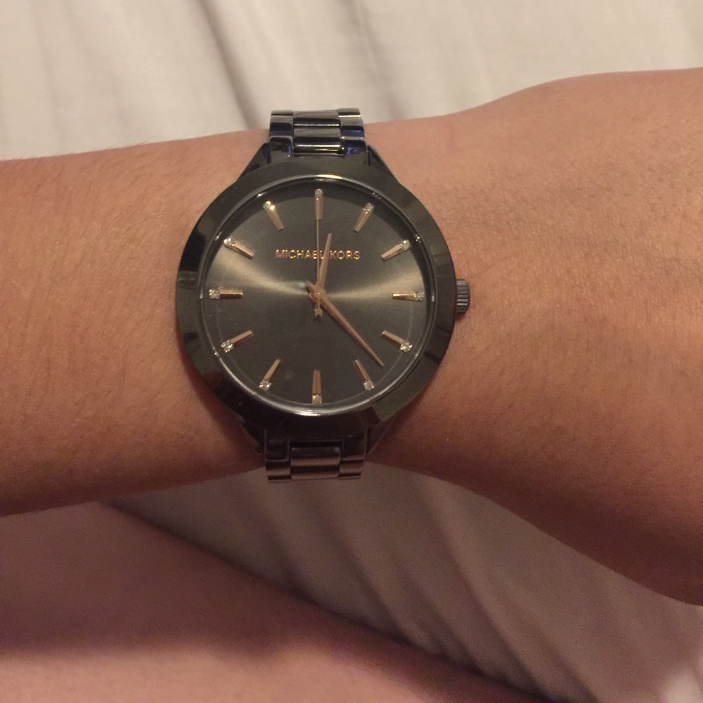 MK gun metal with rose gold hands and dashes.