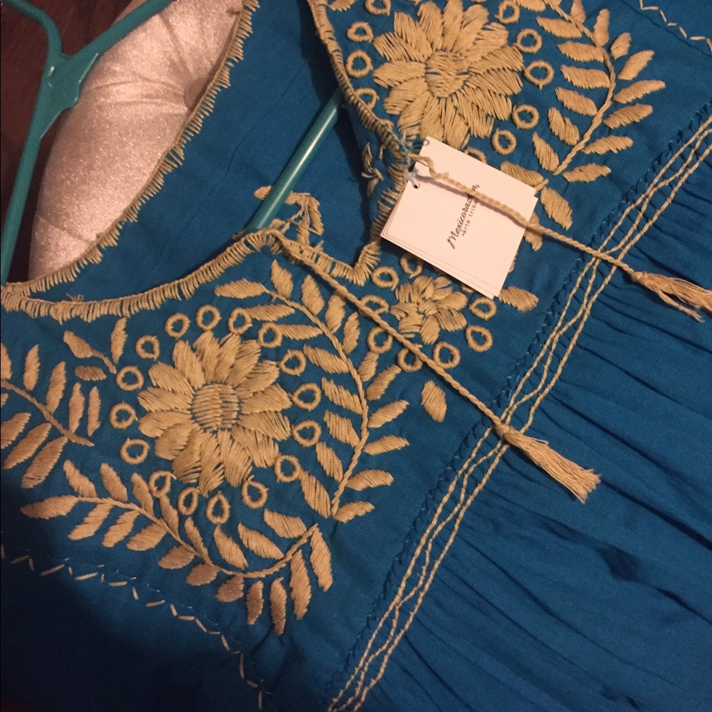 Beautiful turqoise embroided blouse