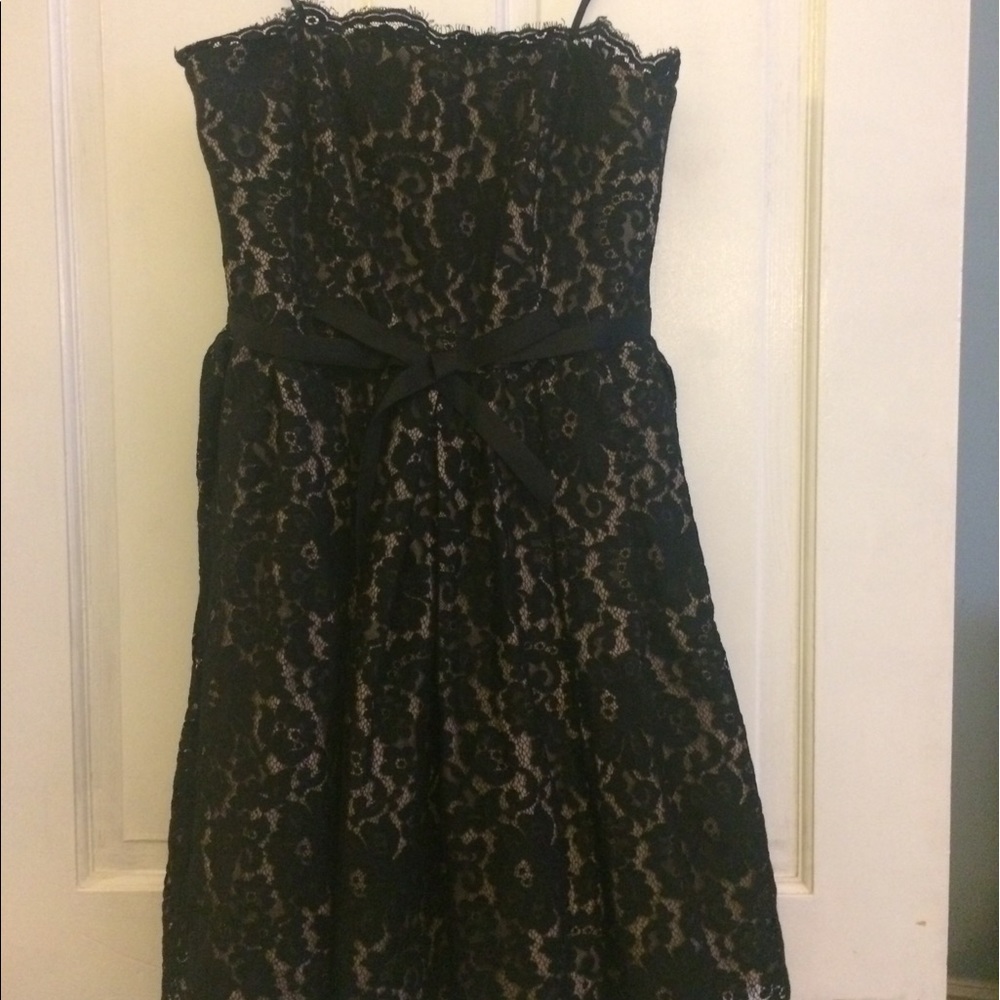 Strapless black dress.