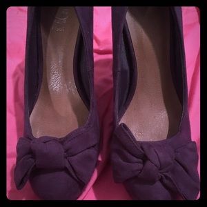 Purple suede heels.
