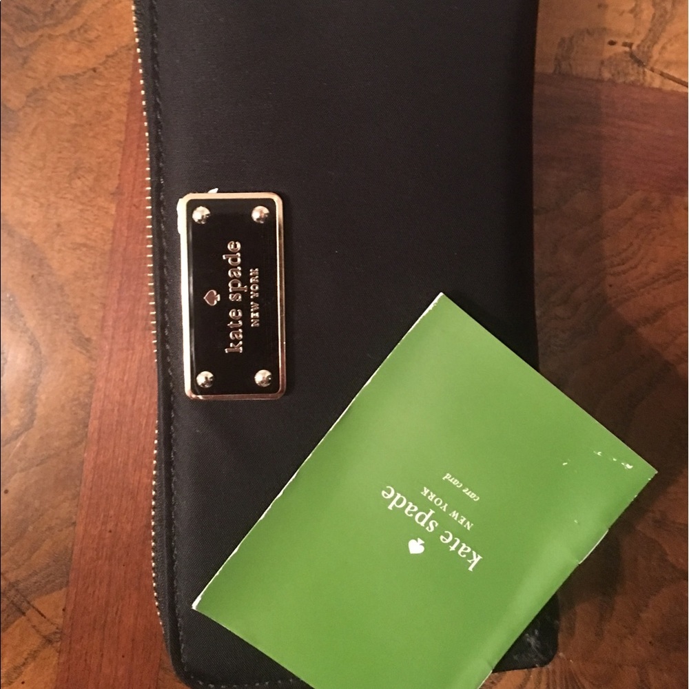 Black Kate Spade Wallet.