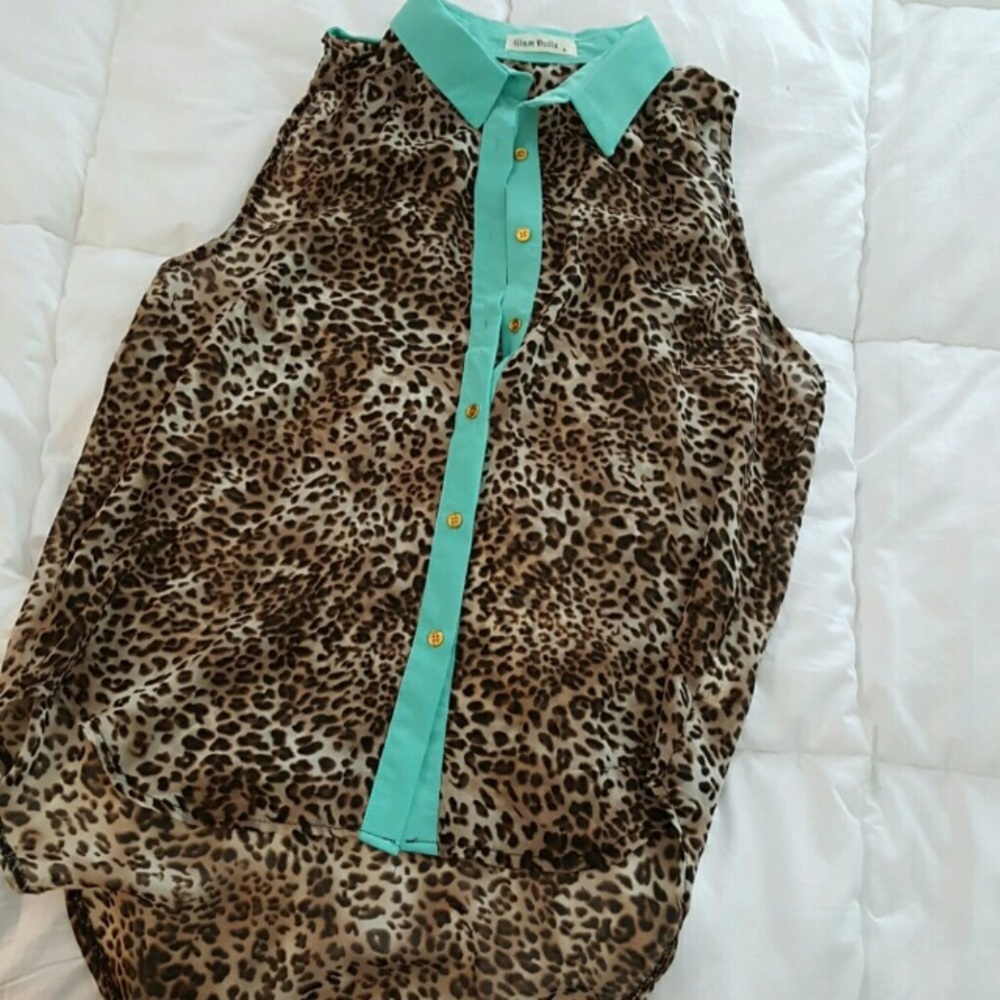 Leopard print blouse with mint accent.